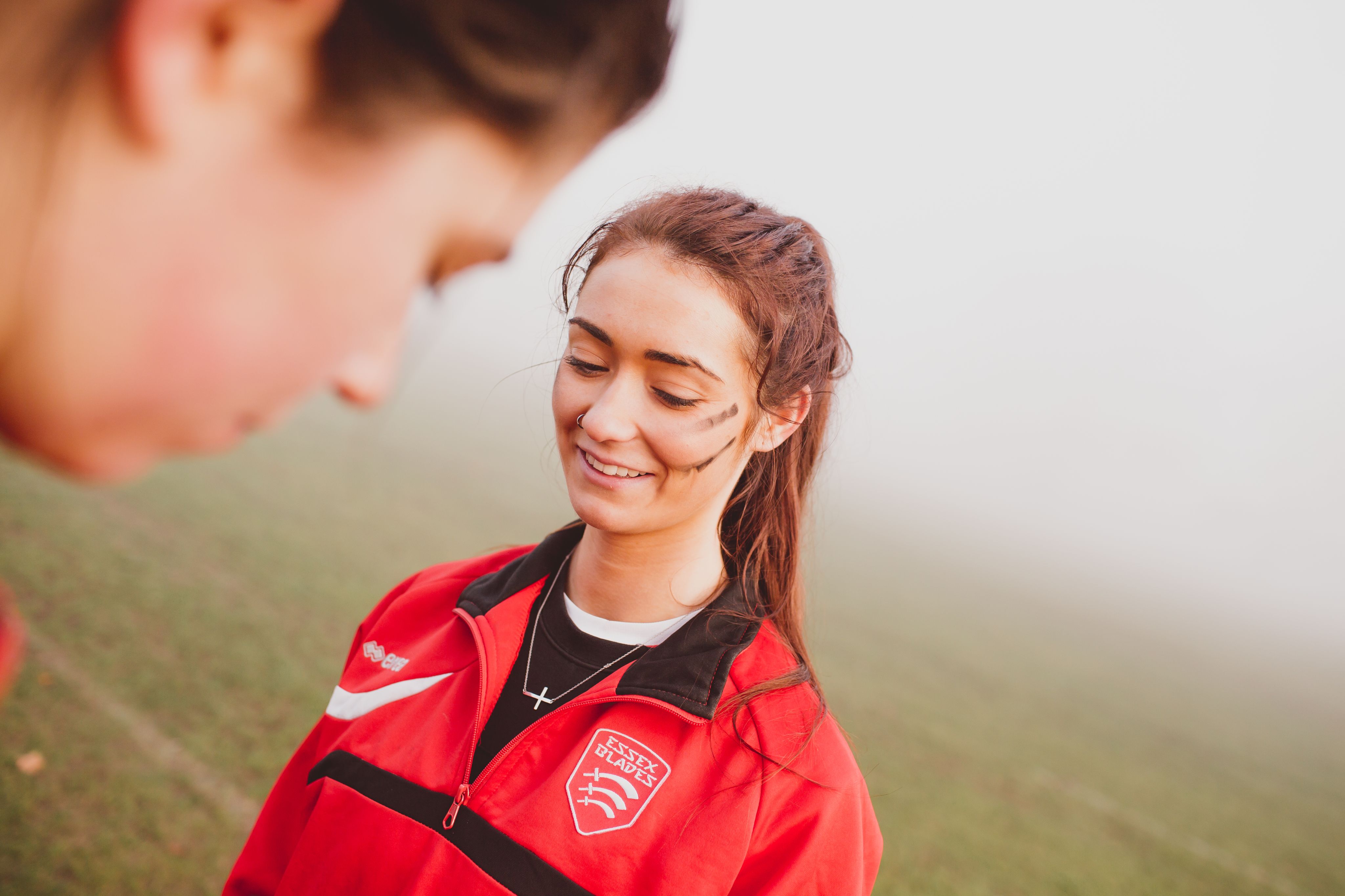 Essex Blades student smiling with face paint on