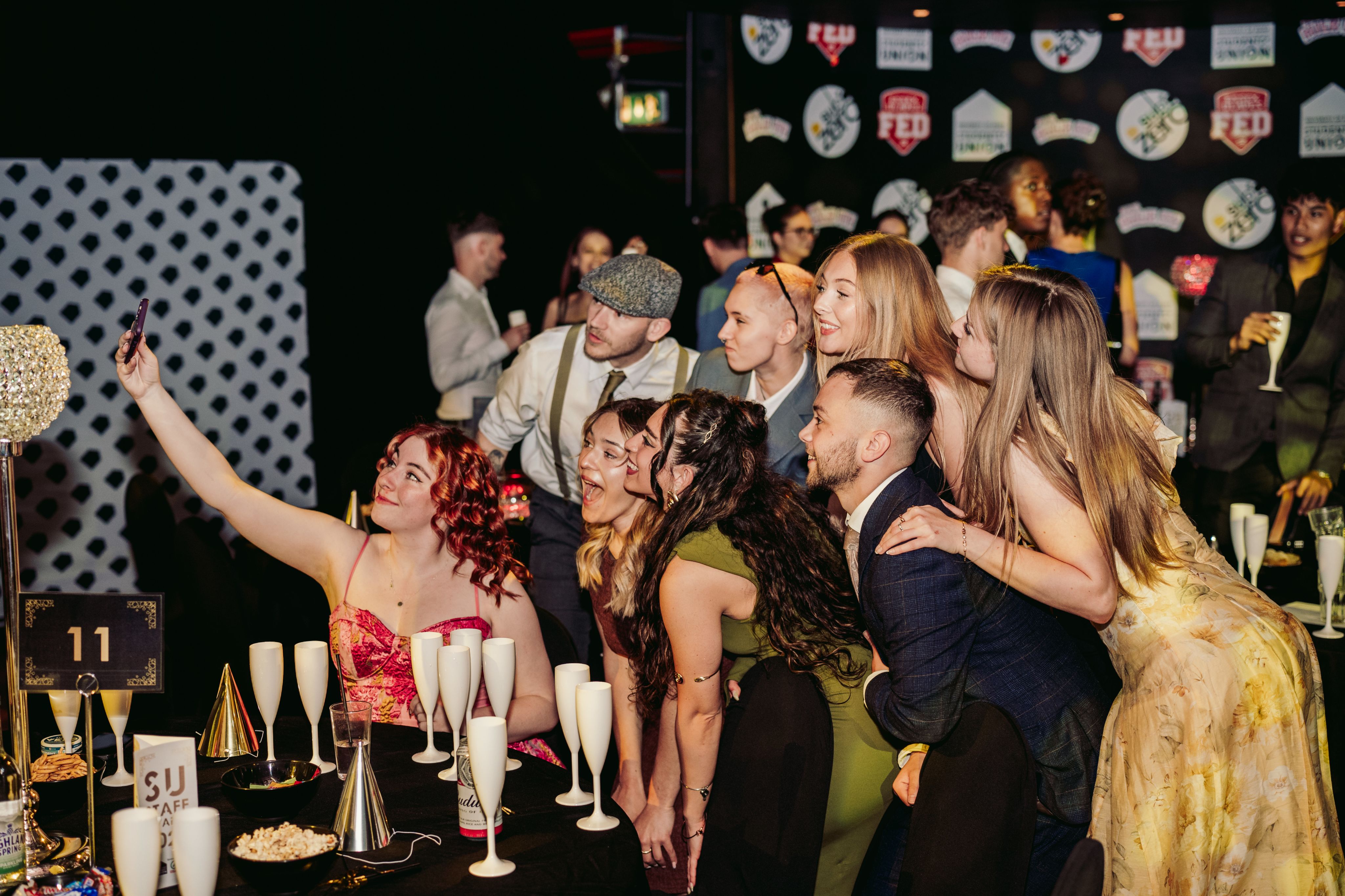 Students taking a selfie at an SU awards event
