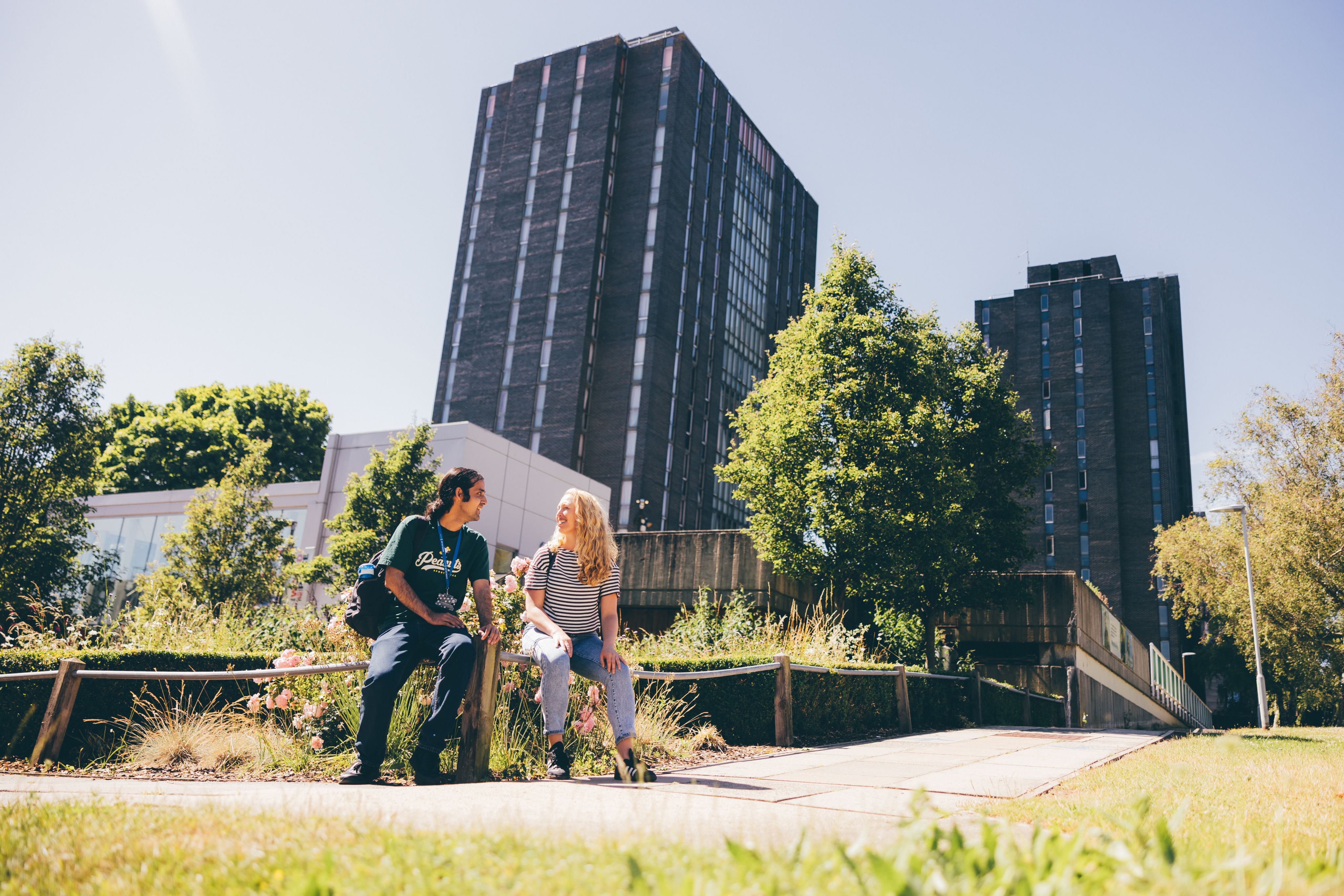 Students sat outside the Towers accommodation