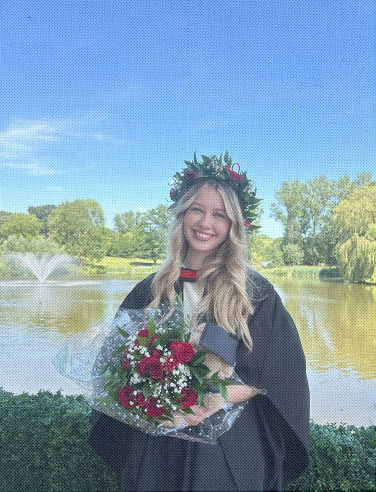 Lily-May at her graduation ceremony wearing the Essex robes