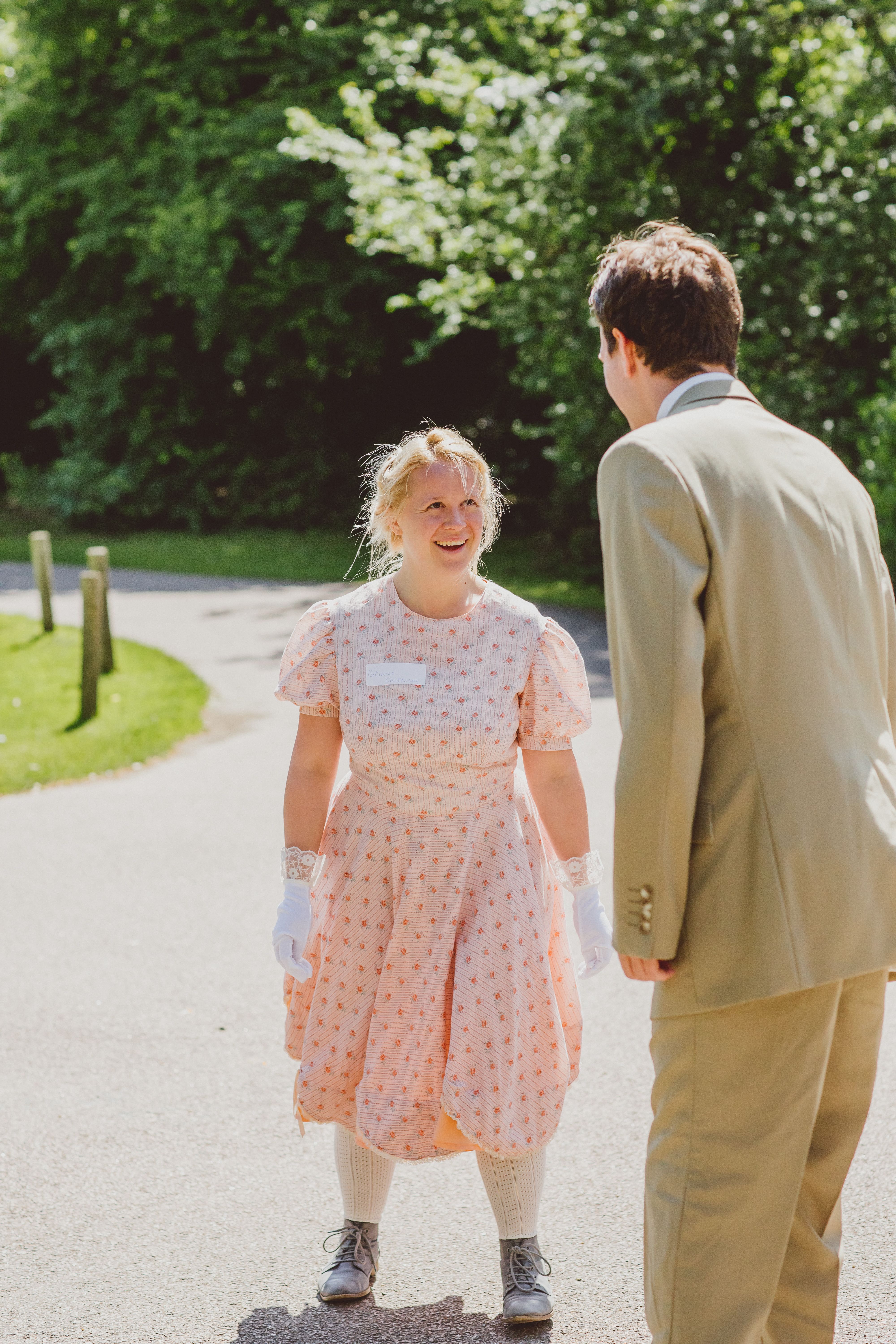 Students rehearsing in Regency attire