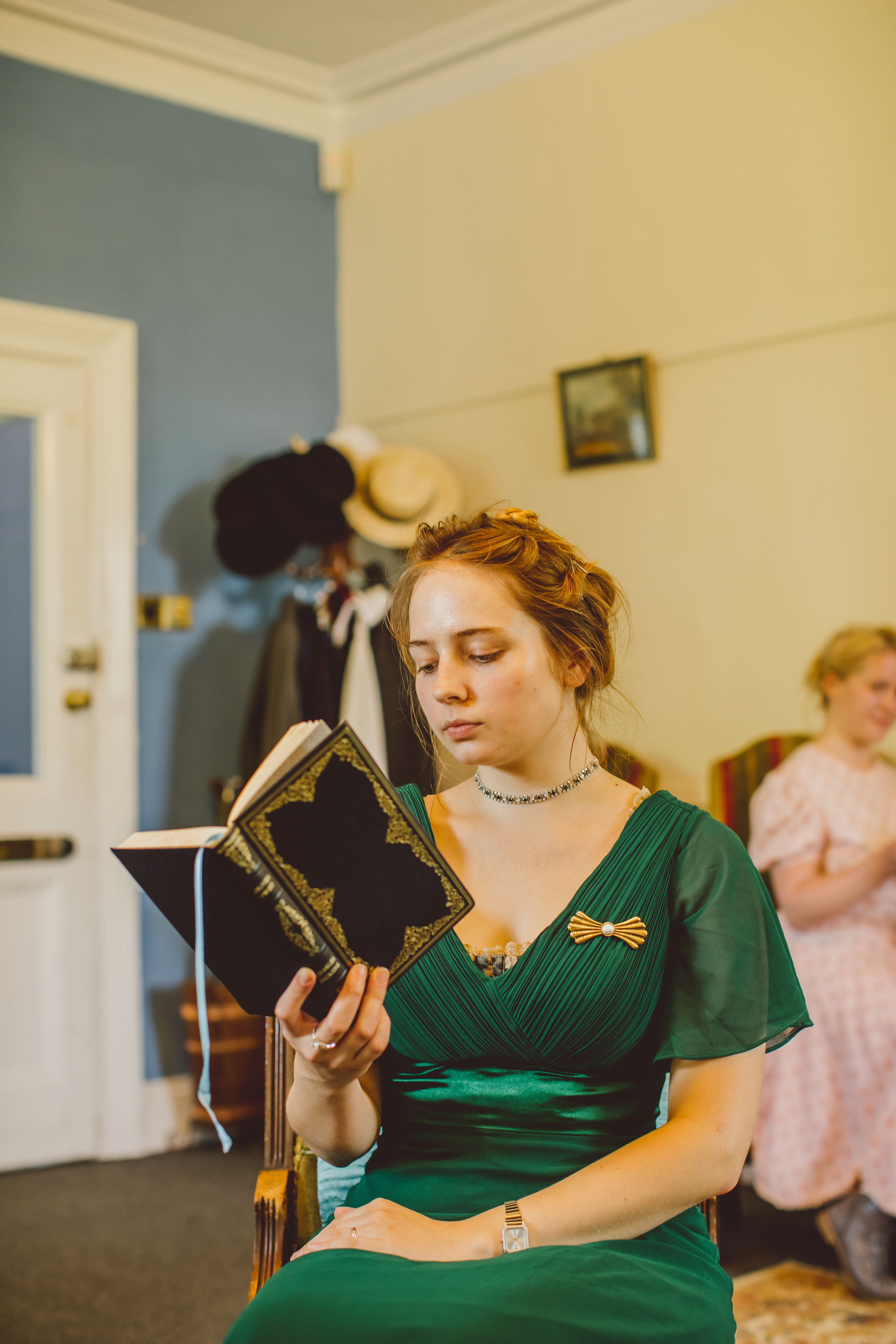 Student reading a novel in character