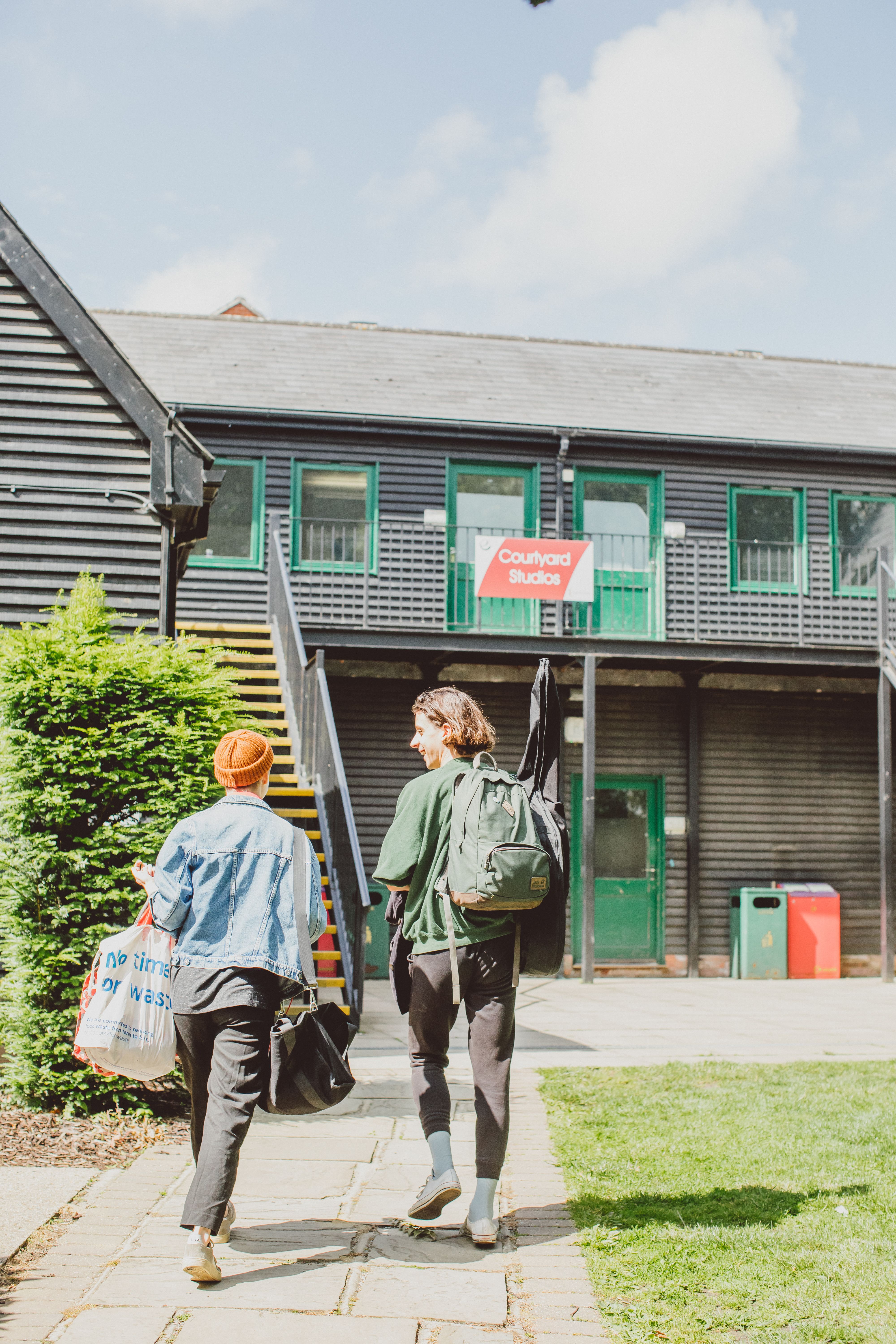 Students walking to Courtyard Studios