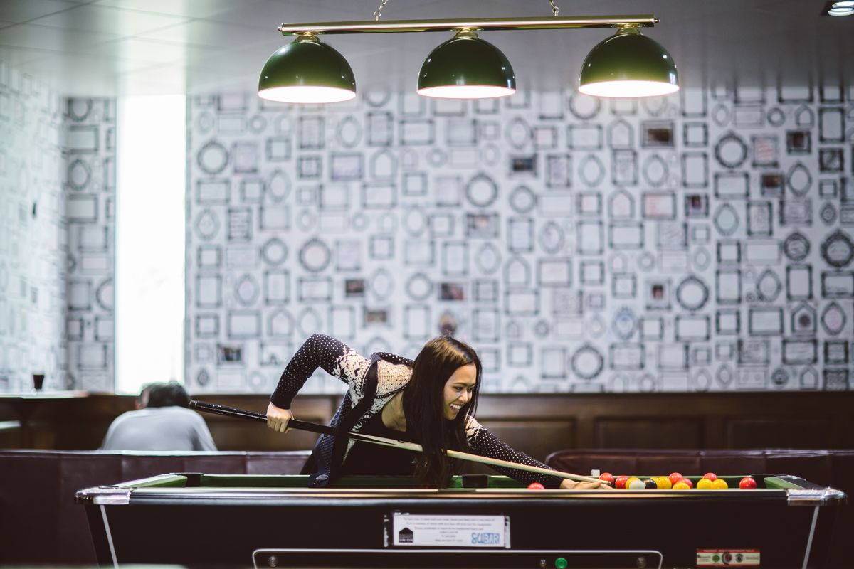 Student playing pool